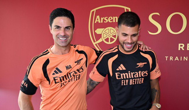 LONDON COLNEY, ENGLAND - AUGUST 08: Bruno Guimaraes signs for Arsenal with Arsenal Manager Mikel Arteta at Sobha Realty Training Centre on August 08, 2026 in London Colney, England. (Photo by David Price/Arsenal FC via Getty Images)