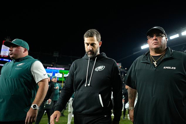 Philadelphia Eagles head coach Nick Sirianni, center, leaves the field after an NFL football game against the Dallas Cowboys in Philadelphia, Monday, Oct. 26, 2026. (AP Photo/Matt Slocum)