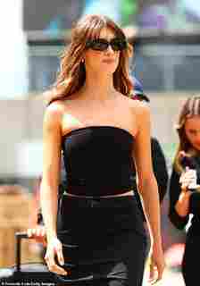 Daisy looked as stylish as ever as she strolled around the paddocks in a black co-ord and shades