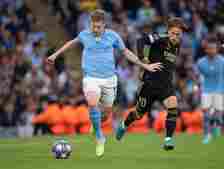 Kevin De Bruyne of Manchester City and Luka Modric of Real Madrid in action during the UEFA Champions League semi-final second leg match between Ma...