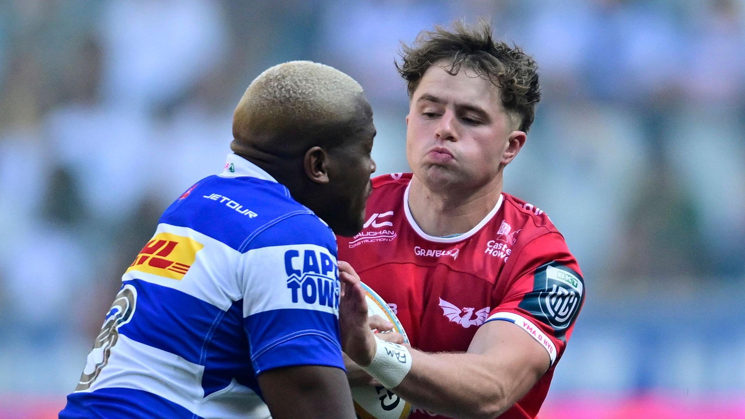 Scarlets wing Macs Page collides with Stormers' Hacjivah Dayimani 