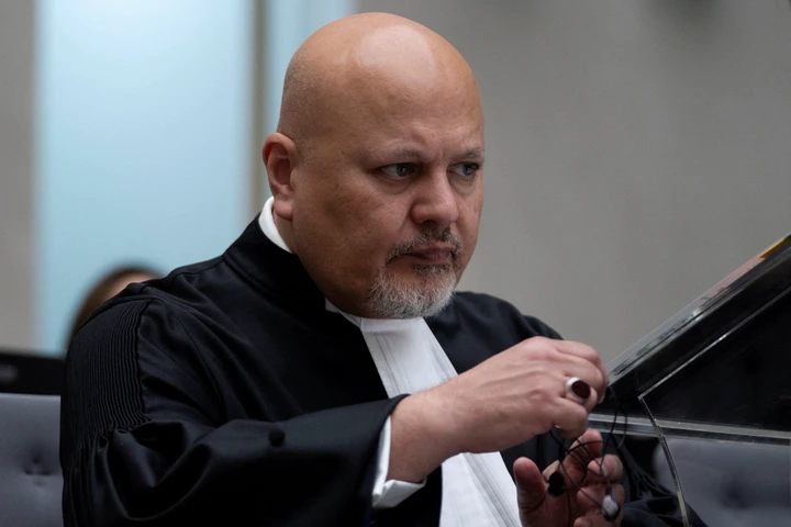 Public Prosecutor Karim Khan prepares for the trial of Mahamat Said Abdel Kani at the International Criminal Court in The Hague