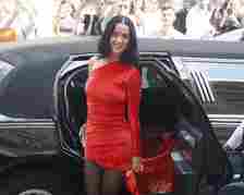 Katy Perry in a red one-shoulder dress in Paris while stepping out of a limo