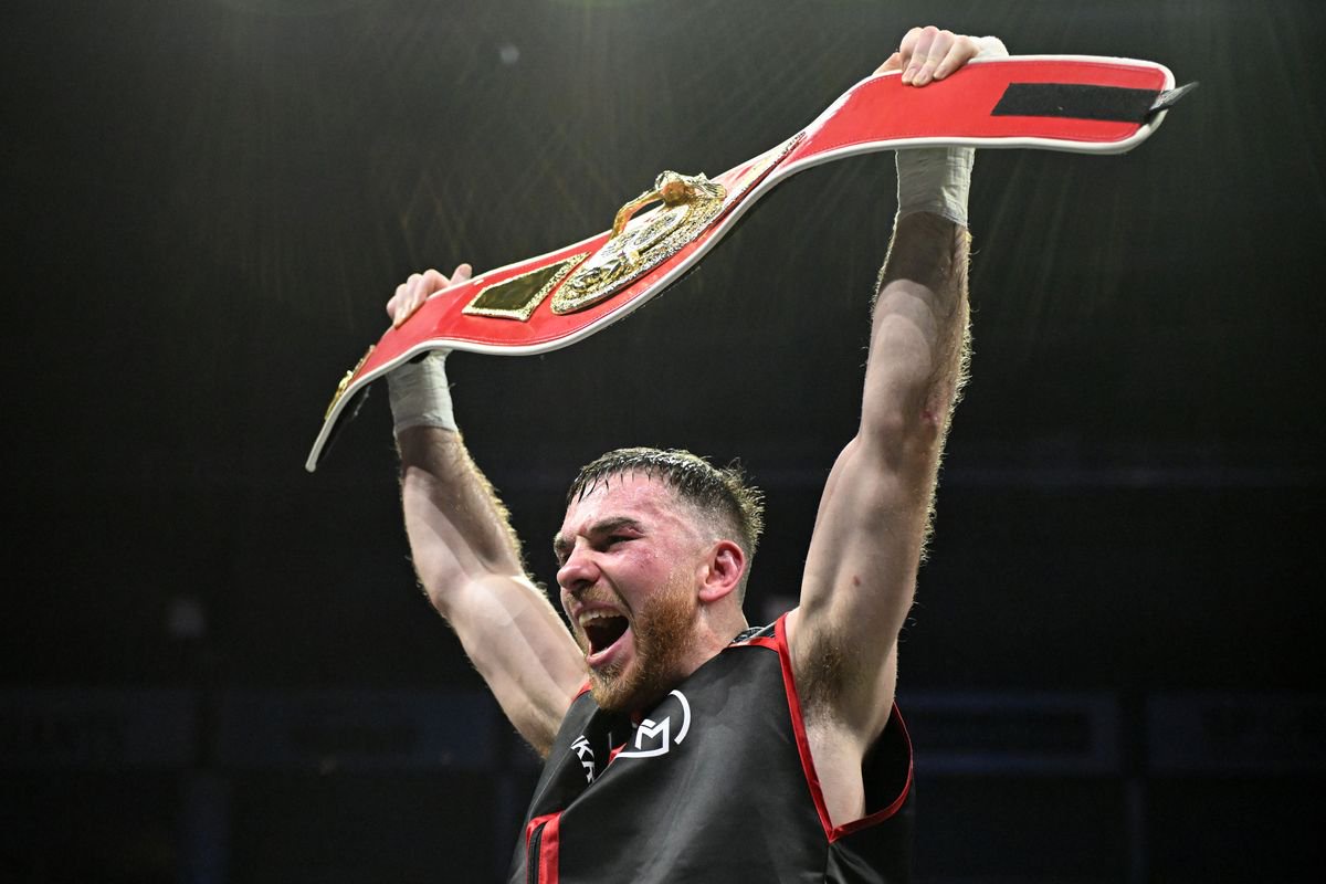 Kieran Molloy celebrates after beating Xavier Kohlen to win the IBF European Welterweight title 