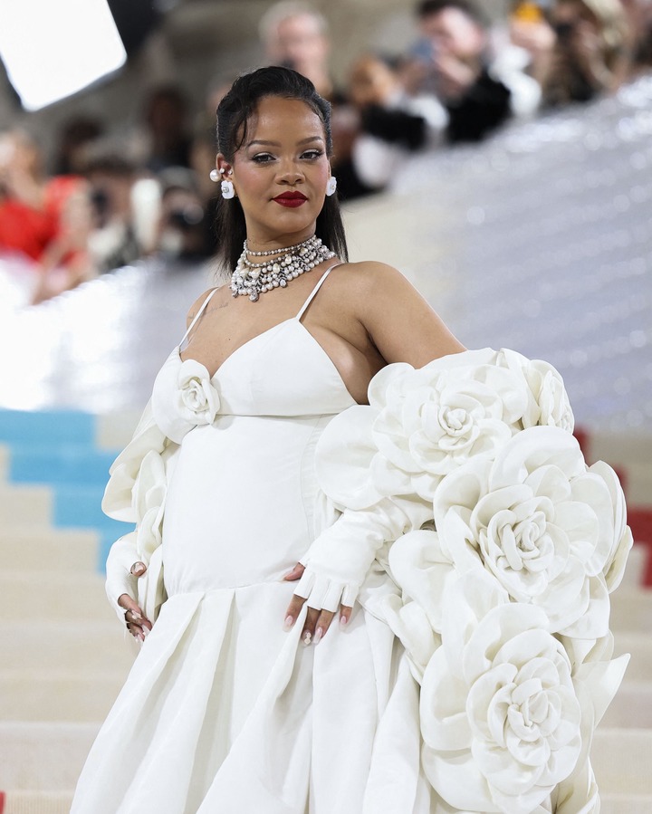 Once Rihanna came out of her shell, she stunned with a white gown