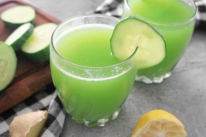 cucumber juice with sliced cucumber pieces