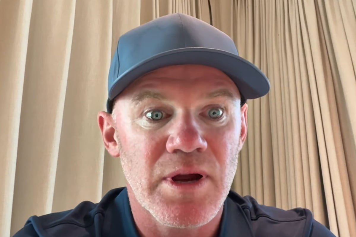 Wayne Rooney speaking into a camera