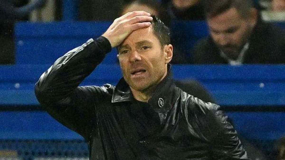 Xabi Alonso puts his hand to his head during the defeat to Tottenham 