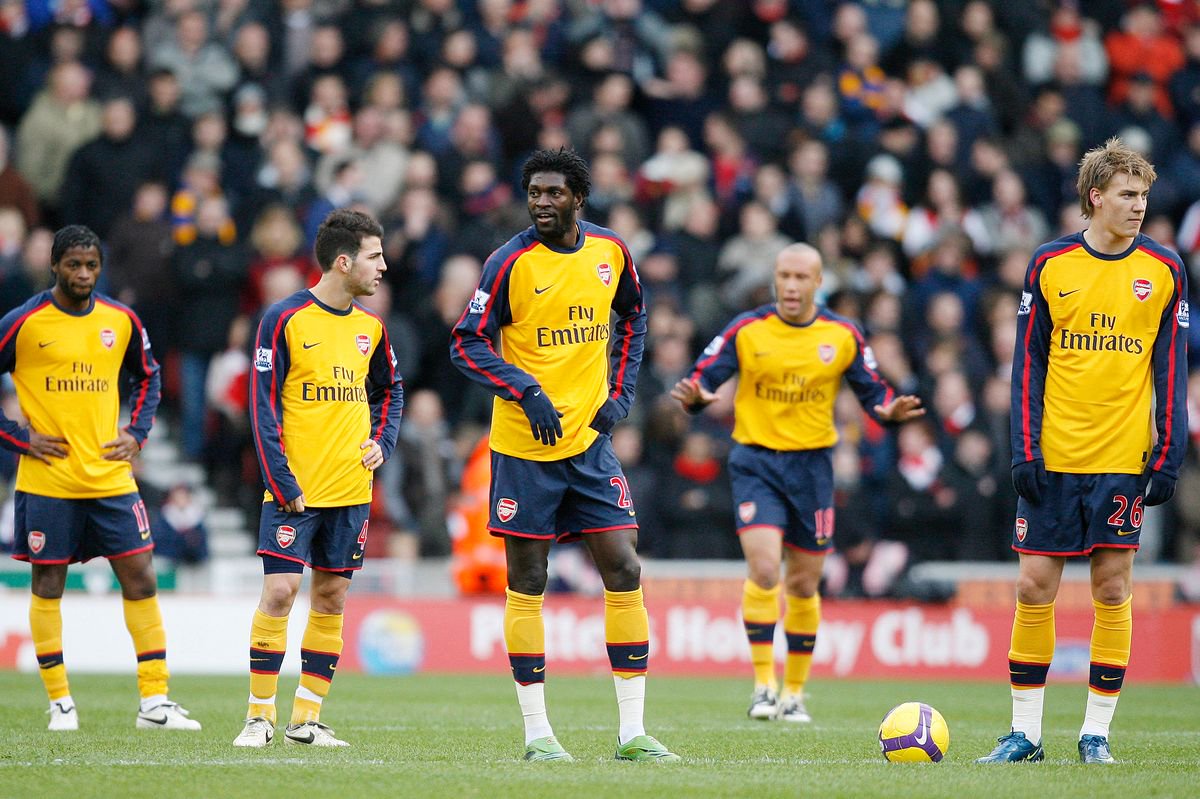 Nicklas Bendtner (R) with Arsenal team-mates