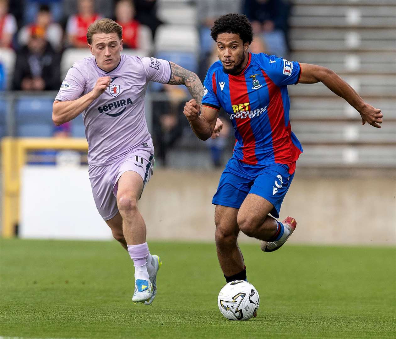 Noa Boutin gets past Raith's John Robertson. Picture: Ken Macpherson