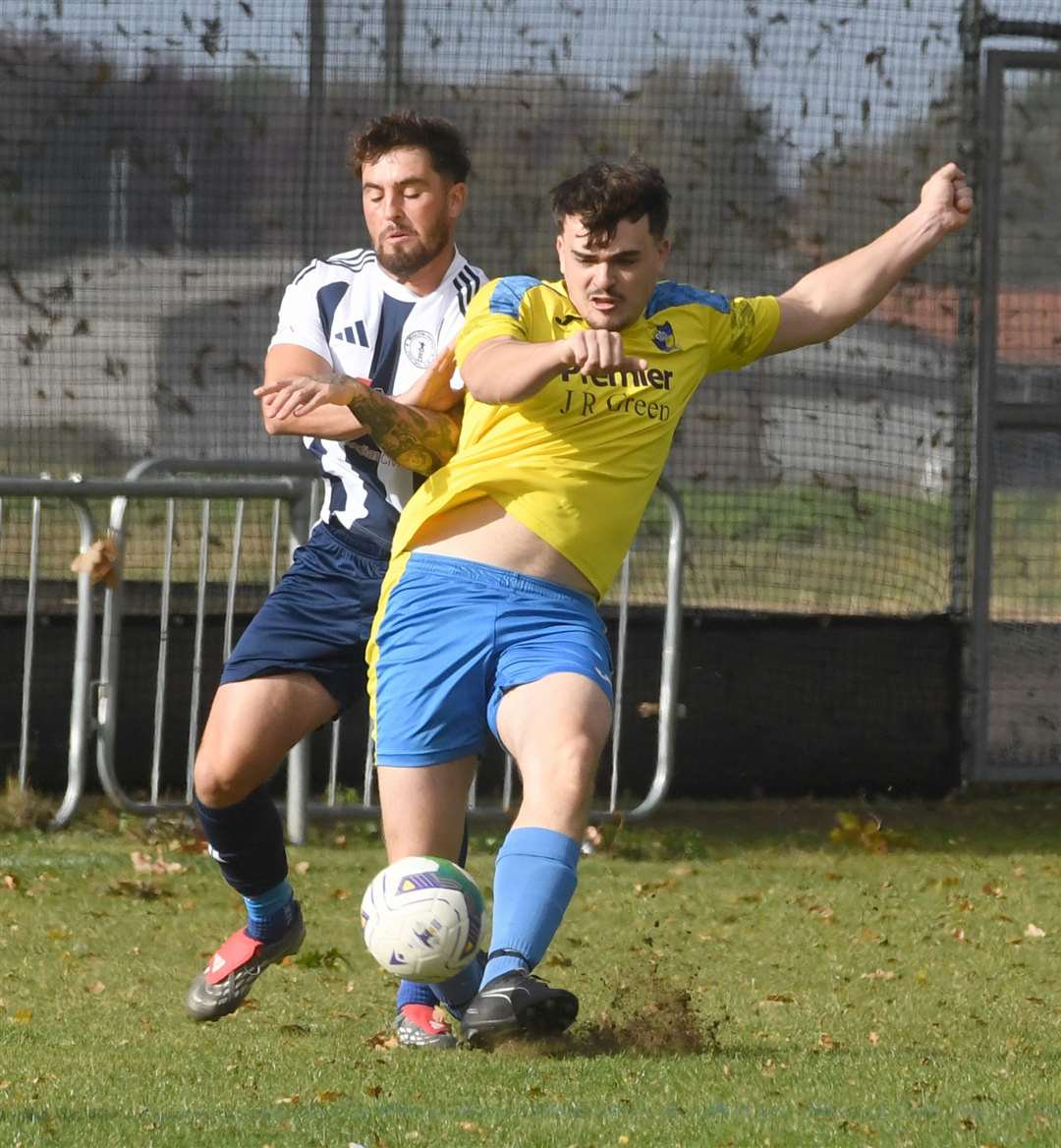 Action from Moulton Harrox's home defeat to Sawtry. Photo: Chris Lowndes