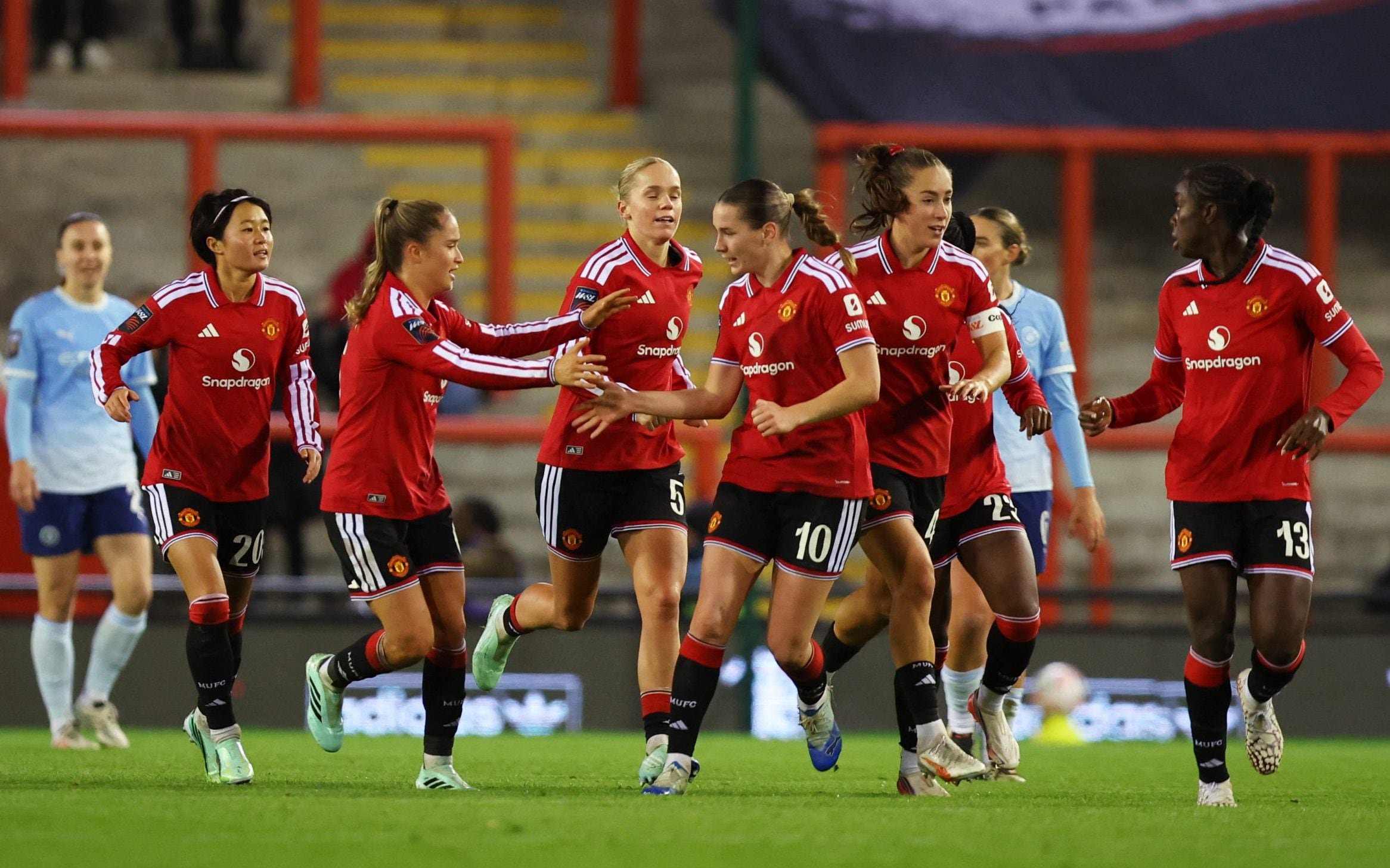 Elisabeth Terland celebrates scoring Manchester United's late equaliser