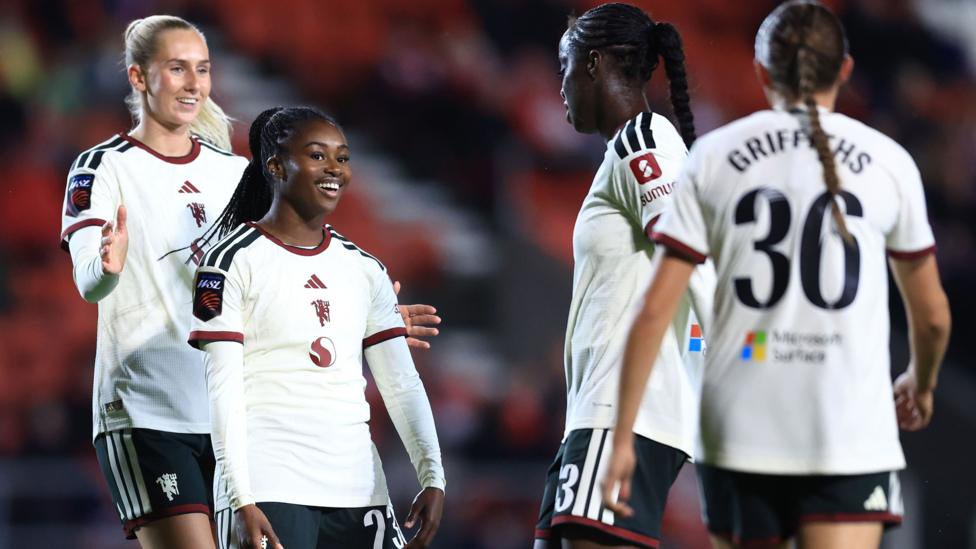 Monica Jusu Bah of Manchester United celebrates scoring her team’s fourth goal