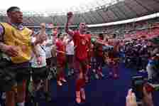 Granit Xhaka of Switzerland celebrates towards the fans after the team's progression to the quarter final following the UEFA EURO 2024 round of 16 ...