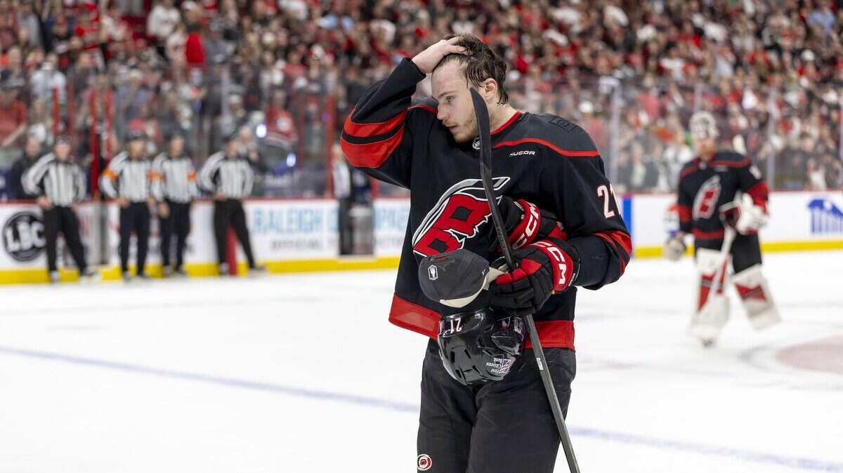 Carolina Hurricanes defenseman Alexander Nikishin (21) leaves the ice with goalie Frederik Andersen (31) following their 6-1 victory over Montreal, clinching the Eastern Conference Finals, on Friday, May 29, 2026 at Lenovo Center in Raleigh, N.C.