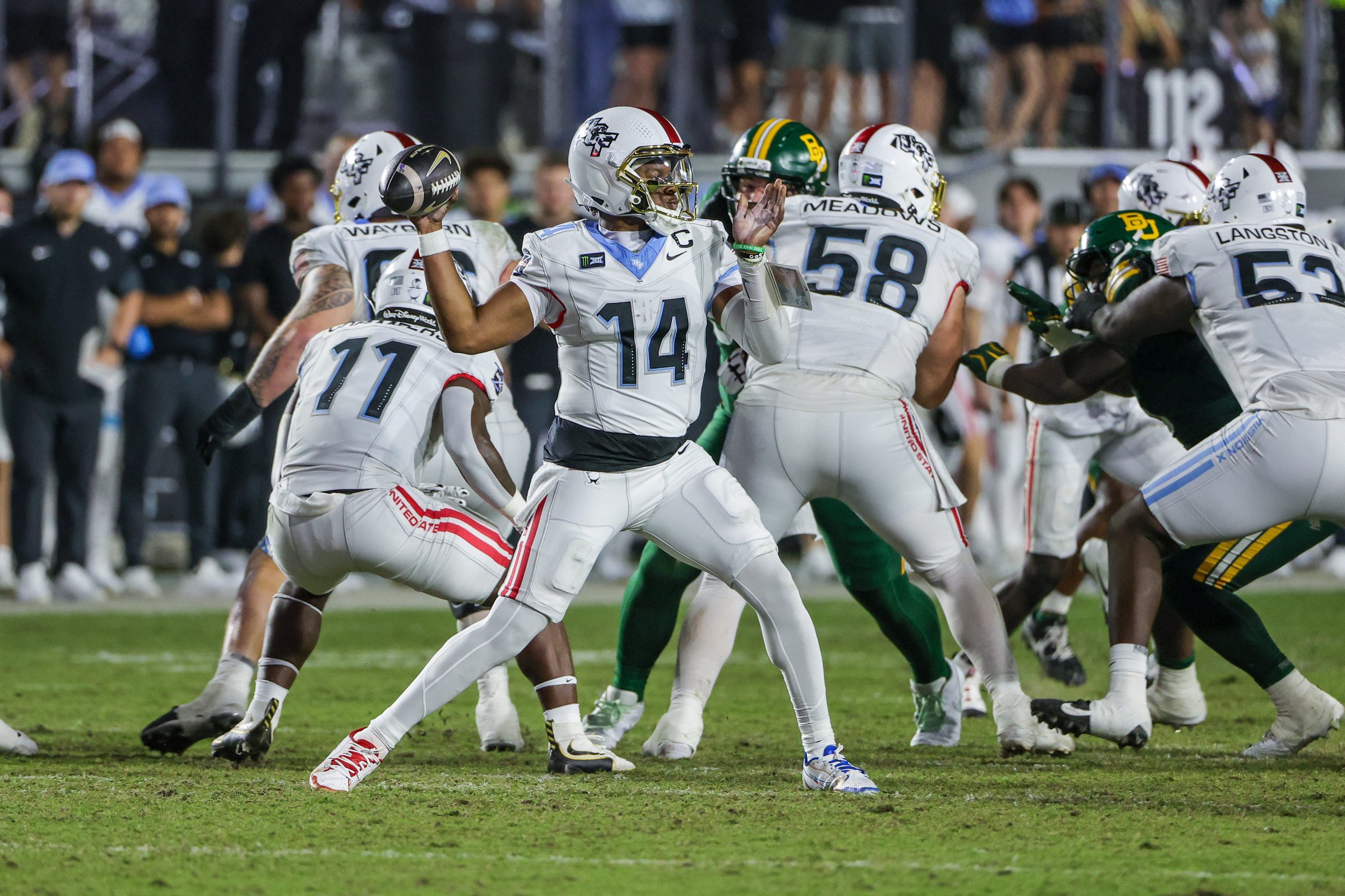 Oct 30, 2026; Orlando, Florida, USA;  Central Florida Knights quarterback Alonza Barnett III (14) throws a pass during the second half against the Baylor Bears at Acrisure Bounce House.  Mandatory Credit: Mike Watters-Imagn Images