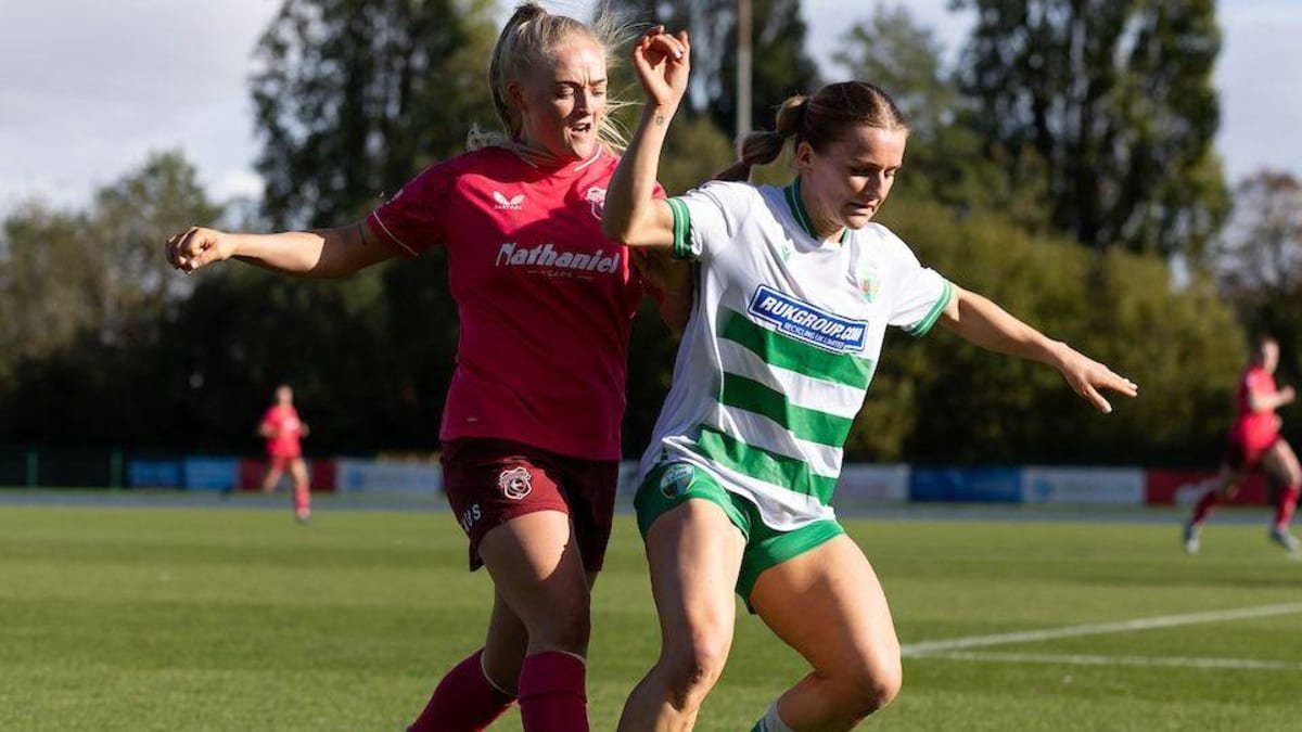 Cardiff City's Lily Billingham battles for the ball with TNS' Lexie Harrison