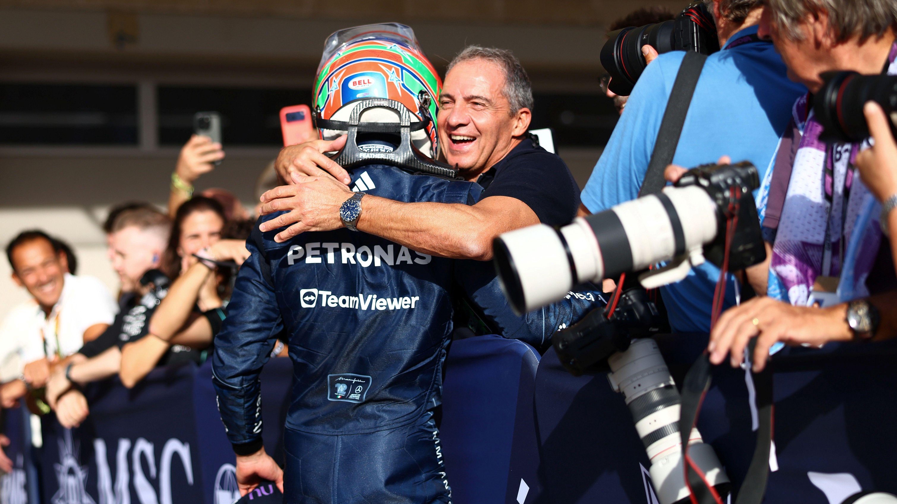 Kimi Antonelli and his father, Marco, hug after the Italian claimed pole position in Austin 
