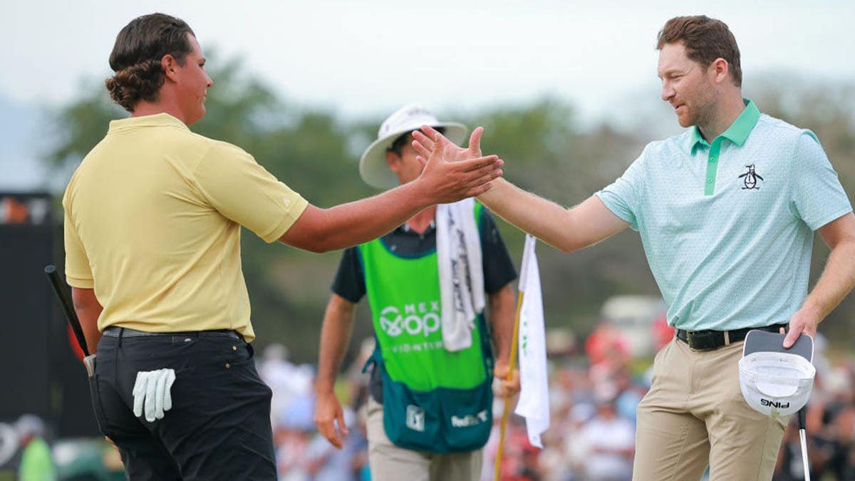 Brian Campbell of the United States reacts with Aldrich Potgieter of South Africa