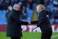 Sean Dyche the manager of Burnley and David Moyes the manager of West Ham United shake hands prior to the Premier League match between Burnley and ...