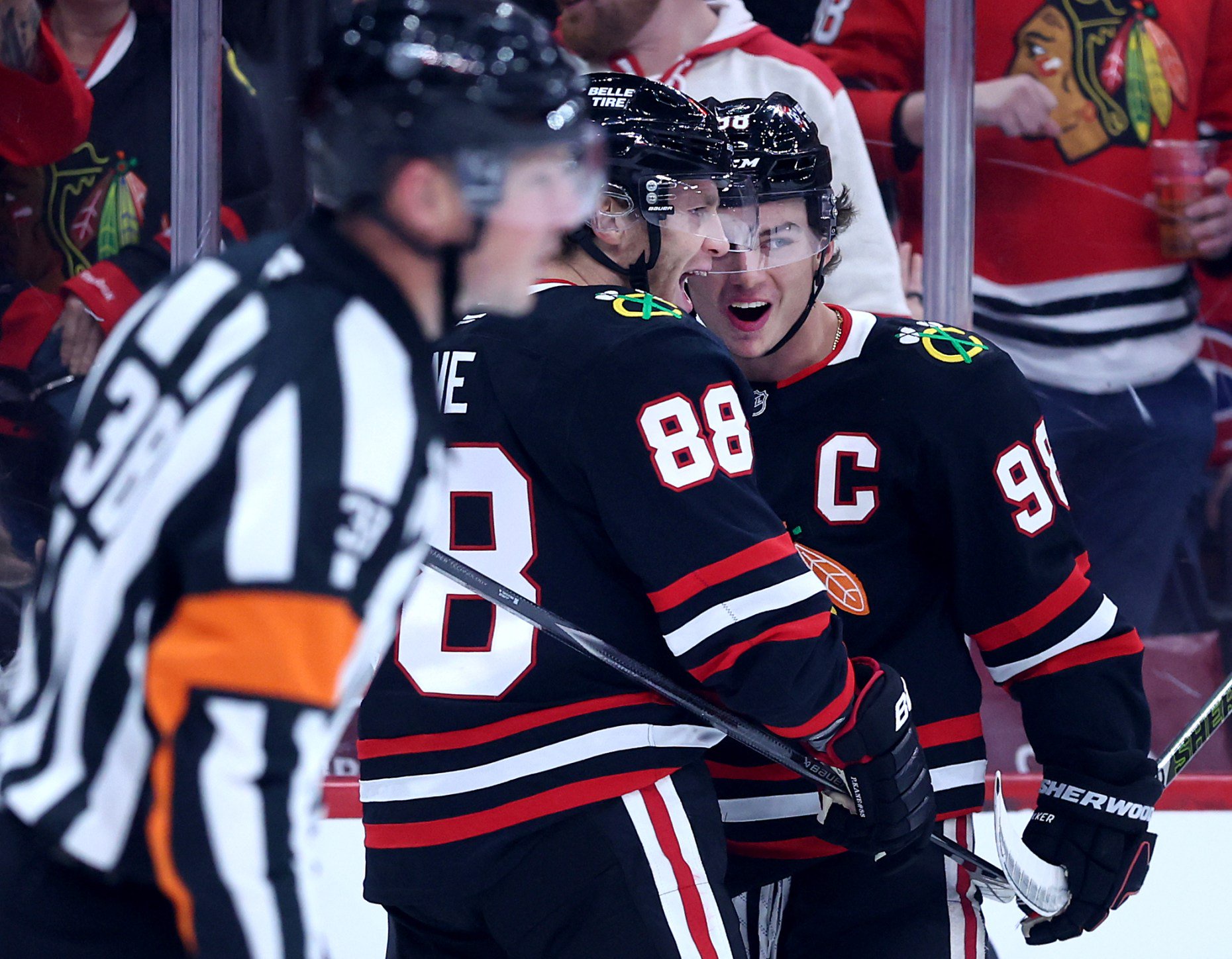 Chicago Blackhawks center Connor Bedard (98) celebrates with teammate Patrick Kane (88) after Bedard scored a goal in the first period of a game against the Montréal Canadiens at the United Center in Chicago on Oct. 23, 2026. (Chris Sweda/Chicago Tribune)