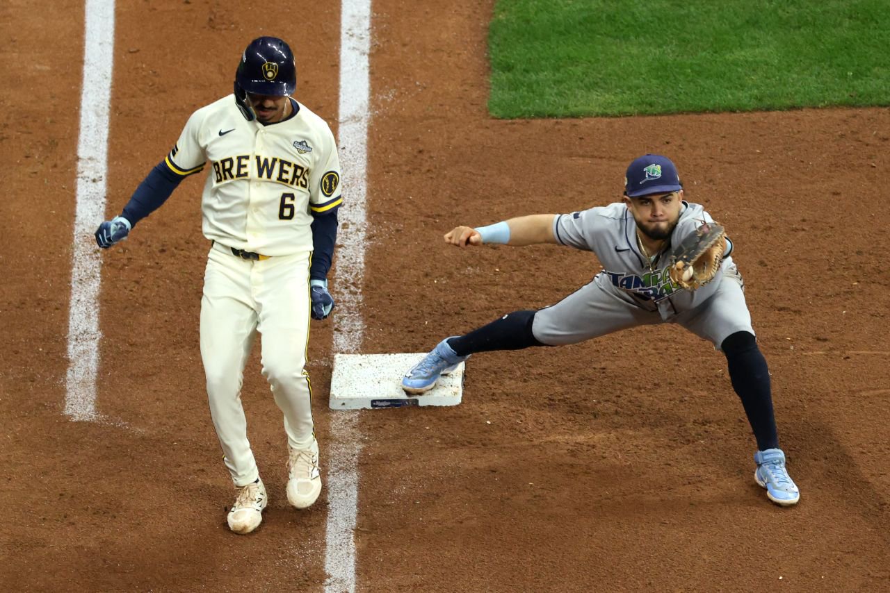 Milwaukee's David Hamilton reaches base after an error in the fourth inning. A run scored on the play to cut into Tampa Bay's lead.