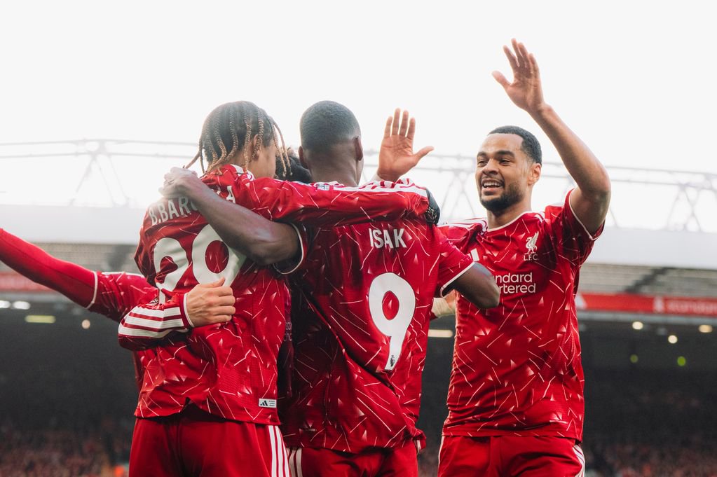 Liverpool players including Cody Gakpo celebrate their second goal against Brighton.