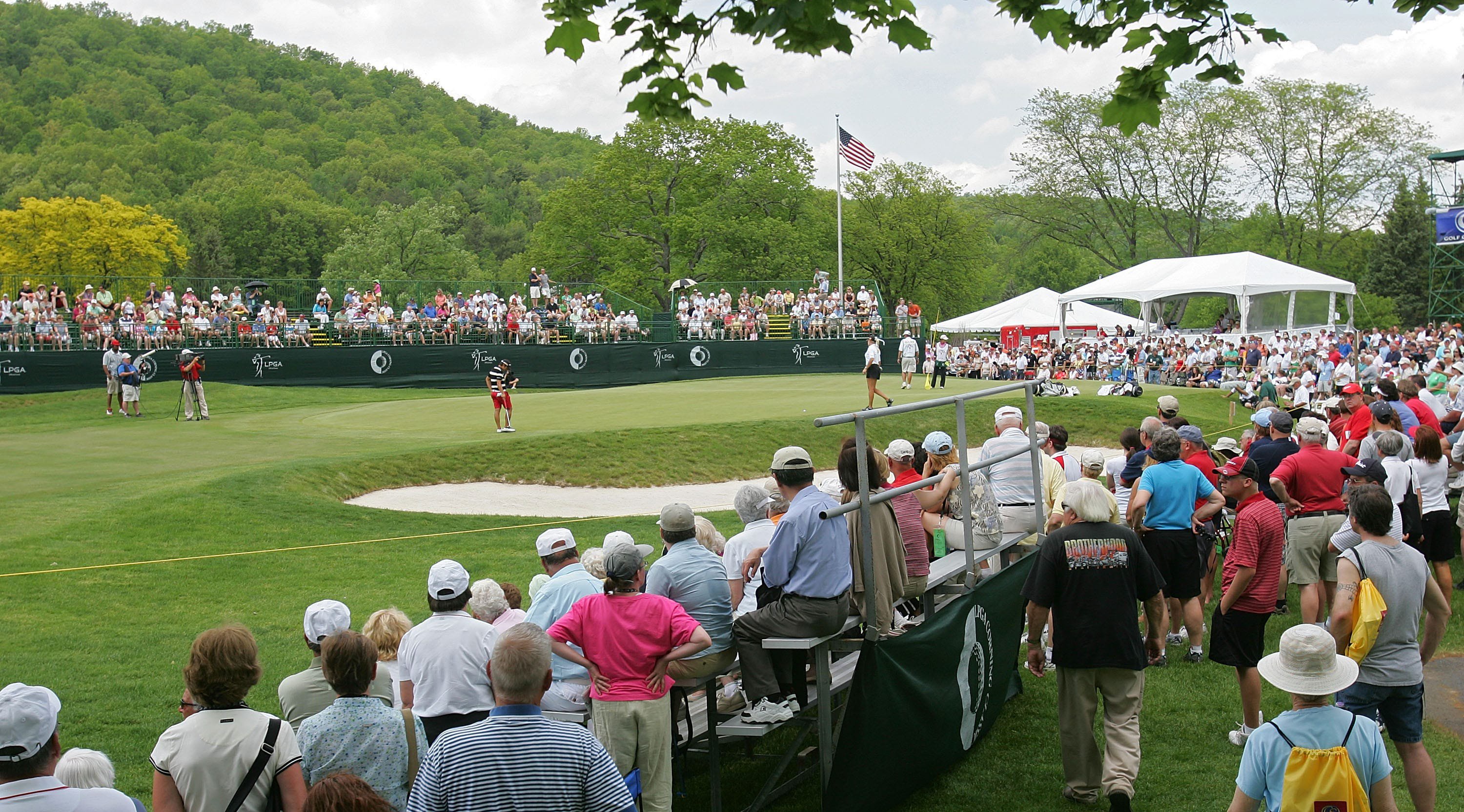 Gallery members line the 18th hole at the LPGA Corning Classic.