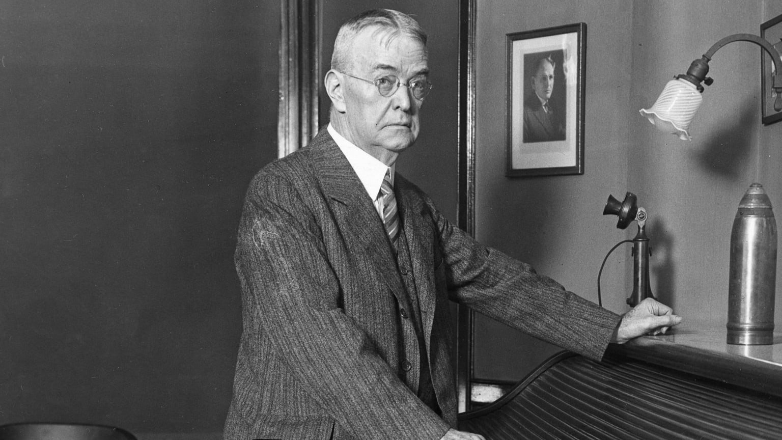 Ban Johnson poses in his Chicago office as he resigns his position as league president, October 1927