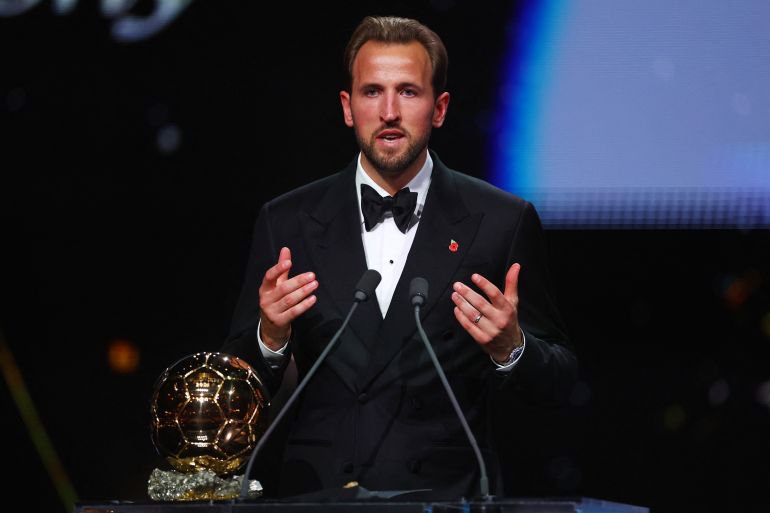 Bayern Munich's Harry Kane makes a speech.