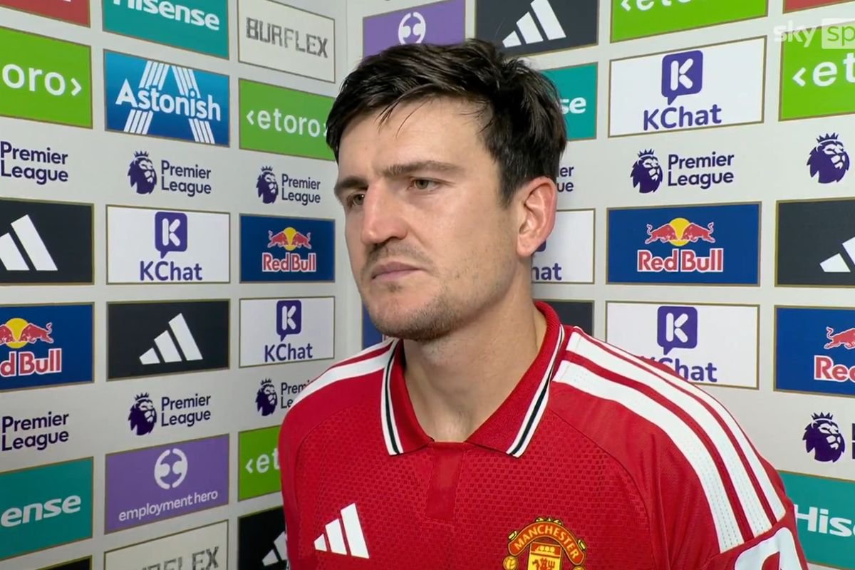 Harry Maguire speaks with a reporter