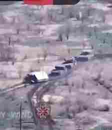 Another video shows three Russian tanks with the covers plodding along through a battlefield at the Ukrainian-held town of Krasnohorivka as they come under fire