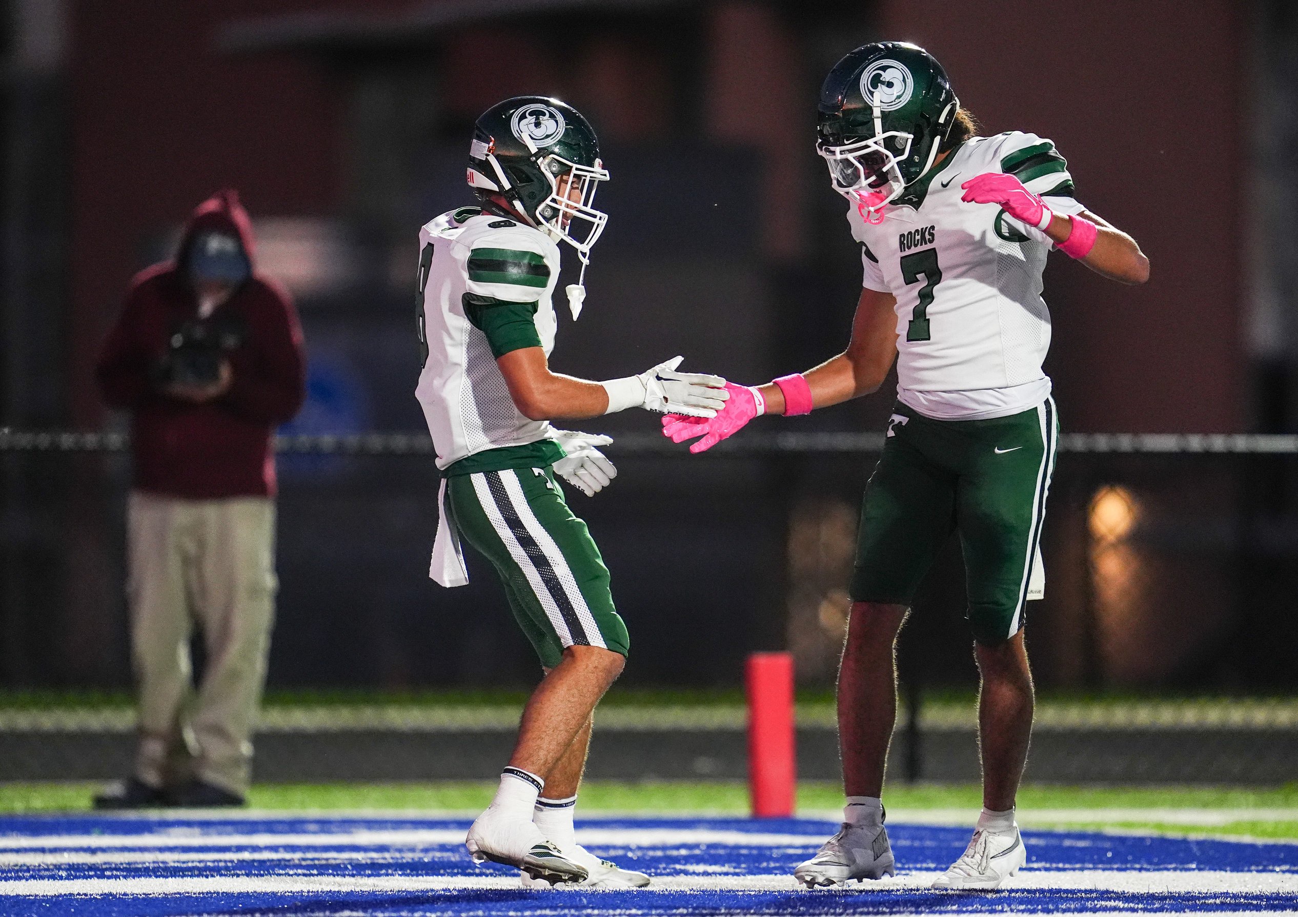 Trinity High School's Ashton Taylor (8) celebrates his touchdown with Trinity High School's Jason Hagan (7) in the first half during KHSAA 6A football in La Grange, Kentucky. October 23, 2026