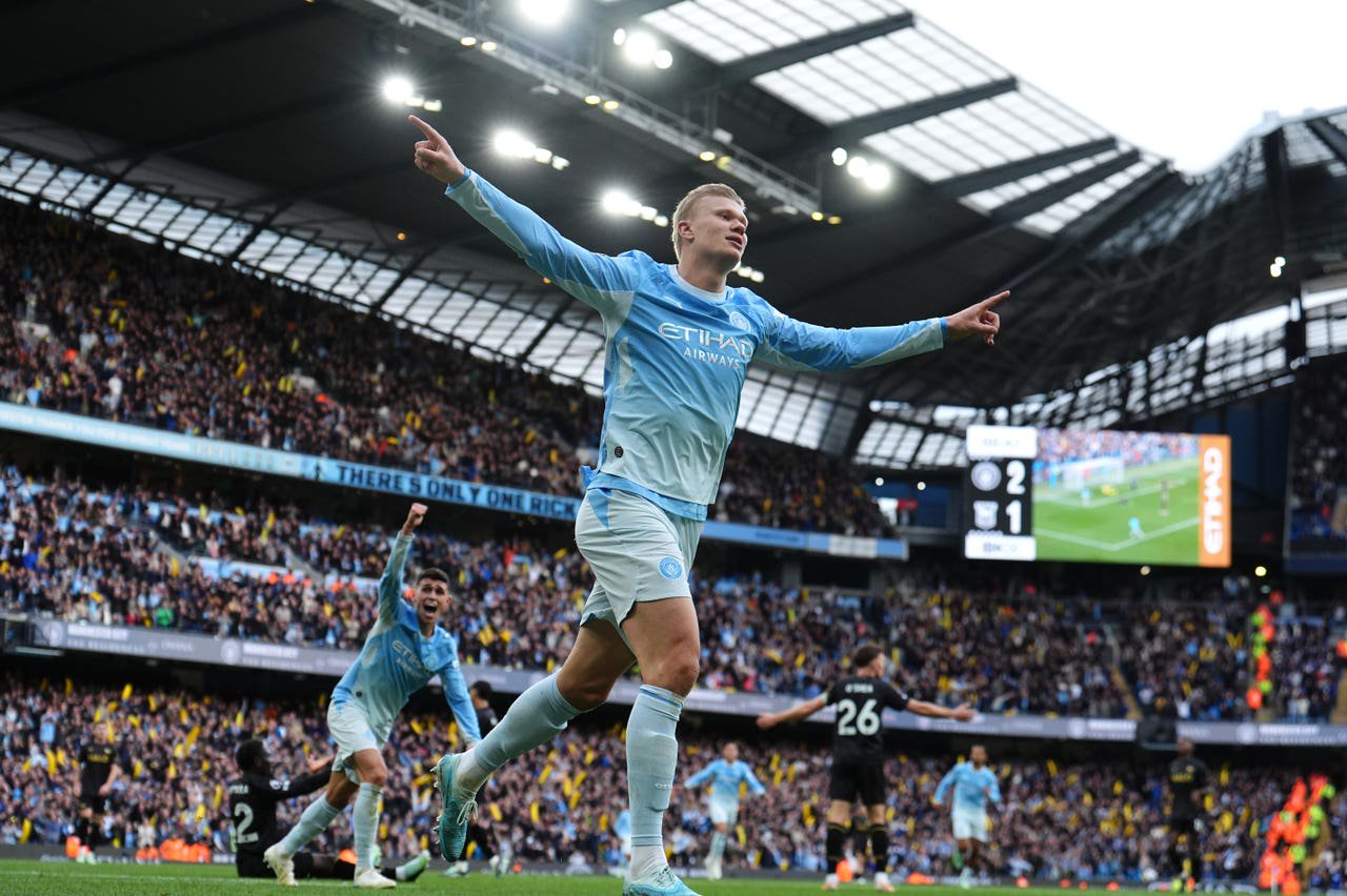 Erling Haaland celebrates his second goal of the day