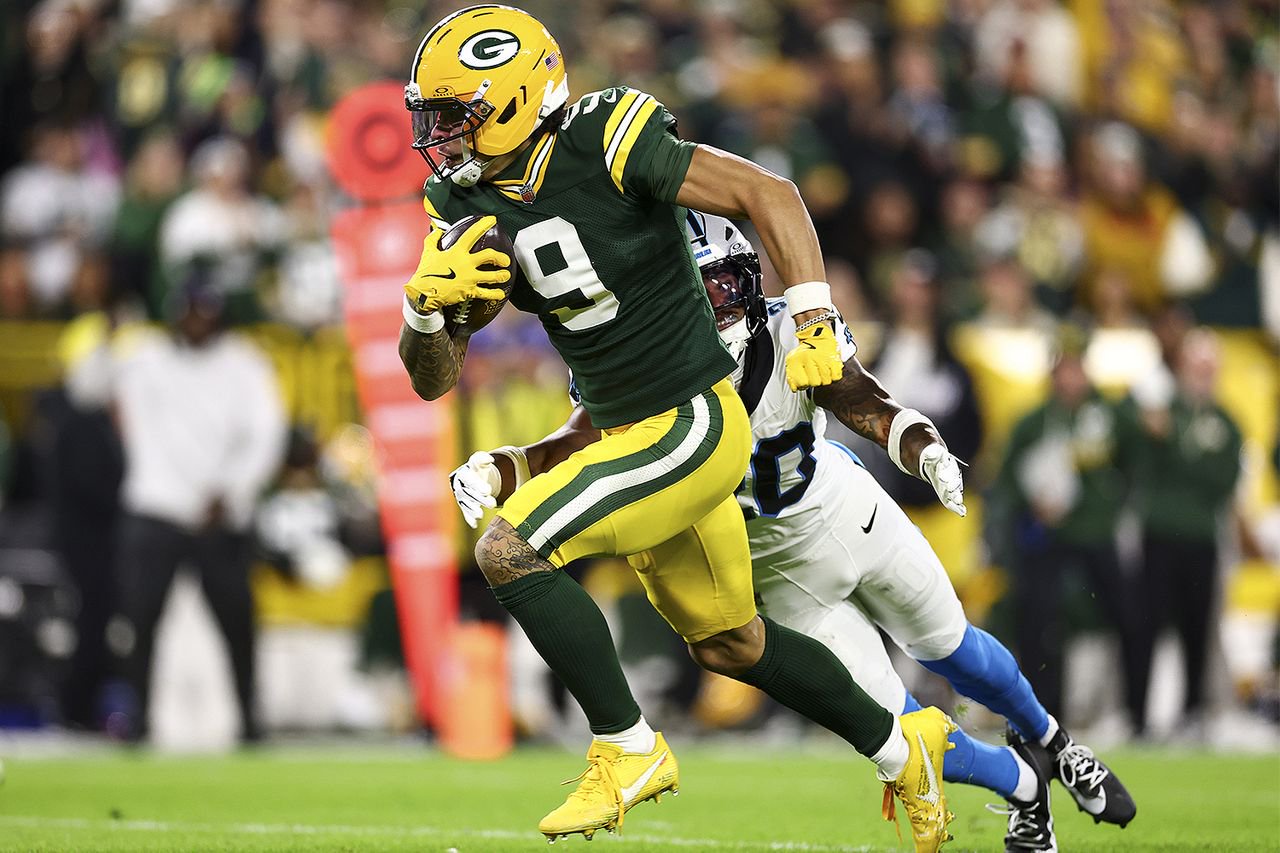 Christian Watson #9 of the Green Bay Packers runs with the ball during the first quarter of an NFL football game against the Carolina Panthers at Lambeau Field on Oct. 29, 2026.Credit: Kevin Sabitus/Getty