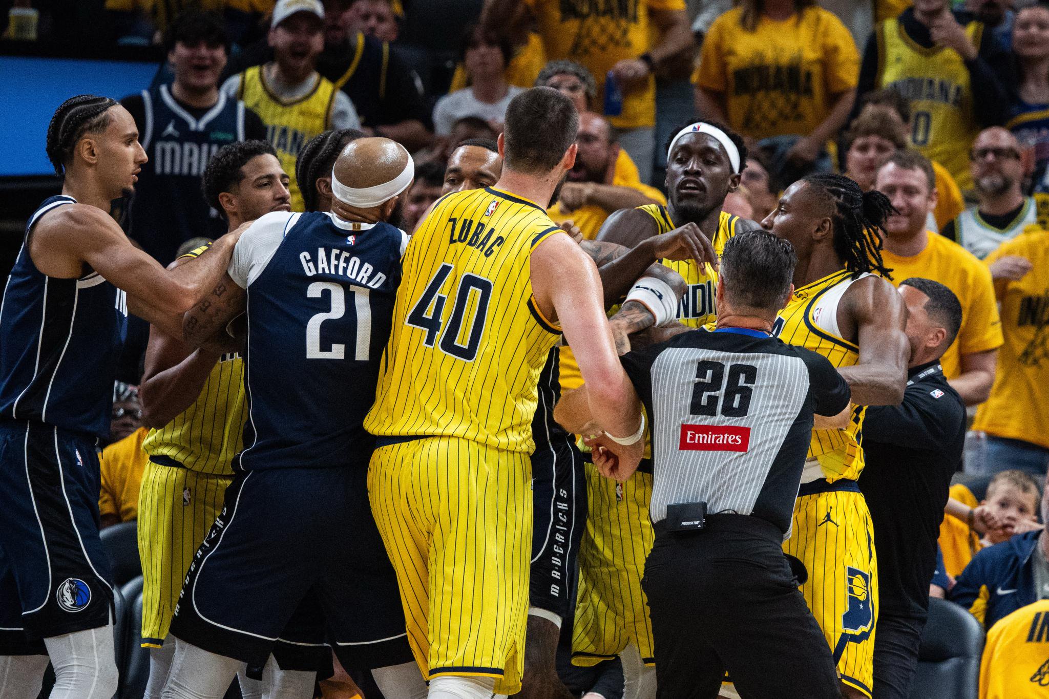Indiana Pacers guard Aaron Nesmith (23) and Dallas Mavericks forward Naji Marshall (3) get into it after a foul in the first half at Gainbridge Fieldhouse.
