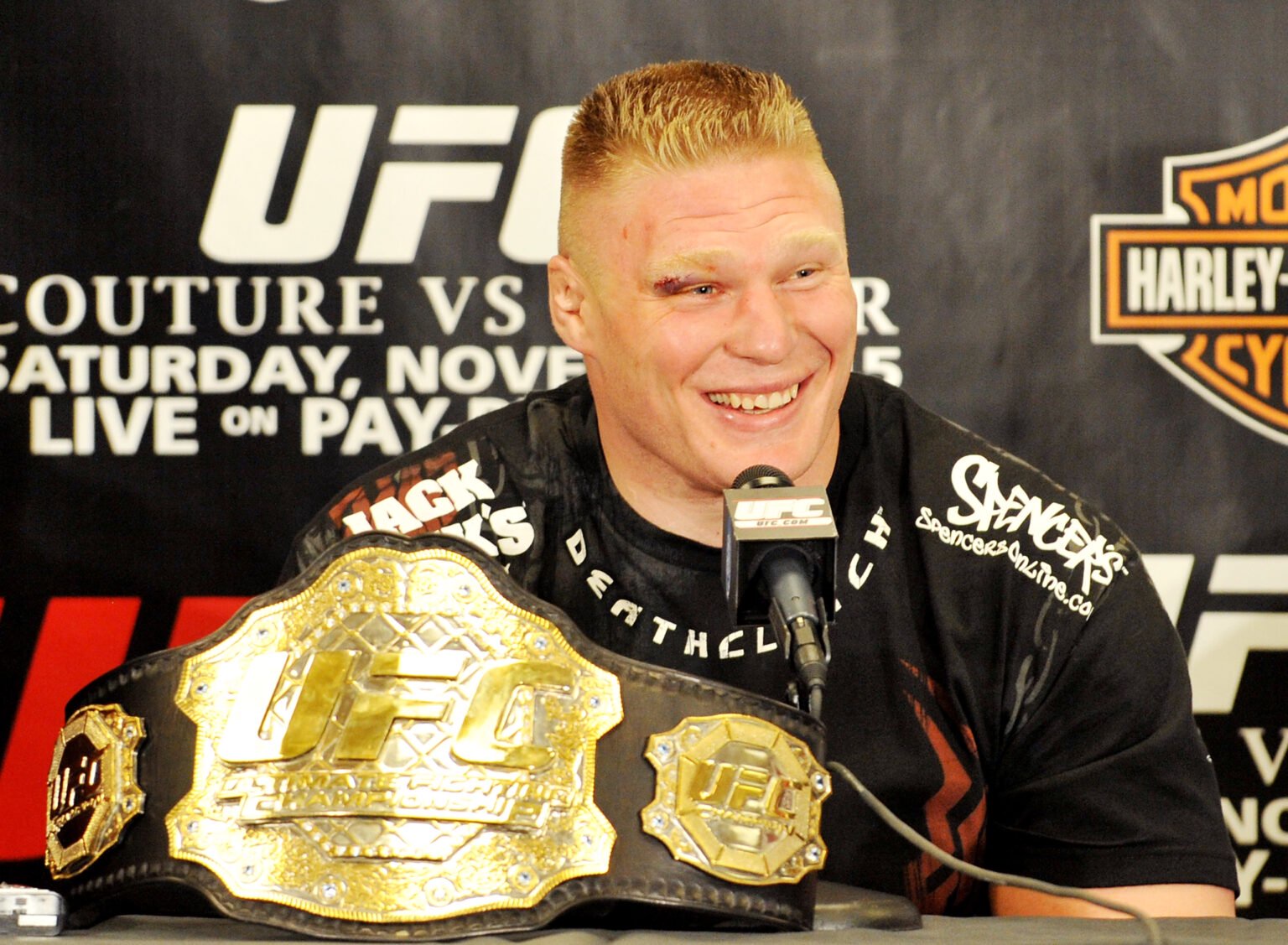 Brock Lesnar sat next to the UFC Heavyweight belt after UFC 91