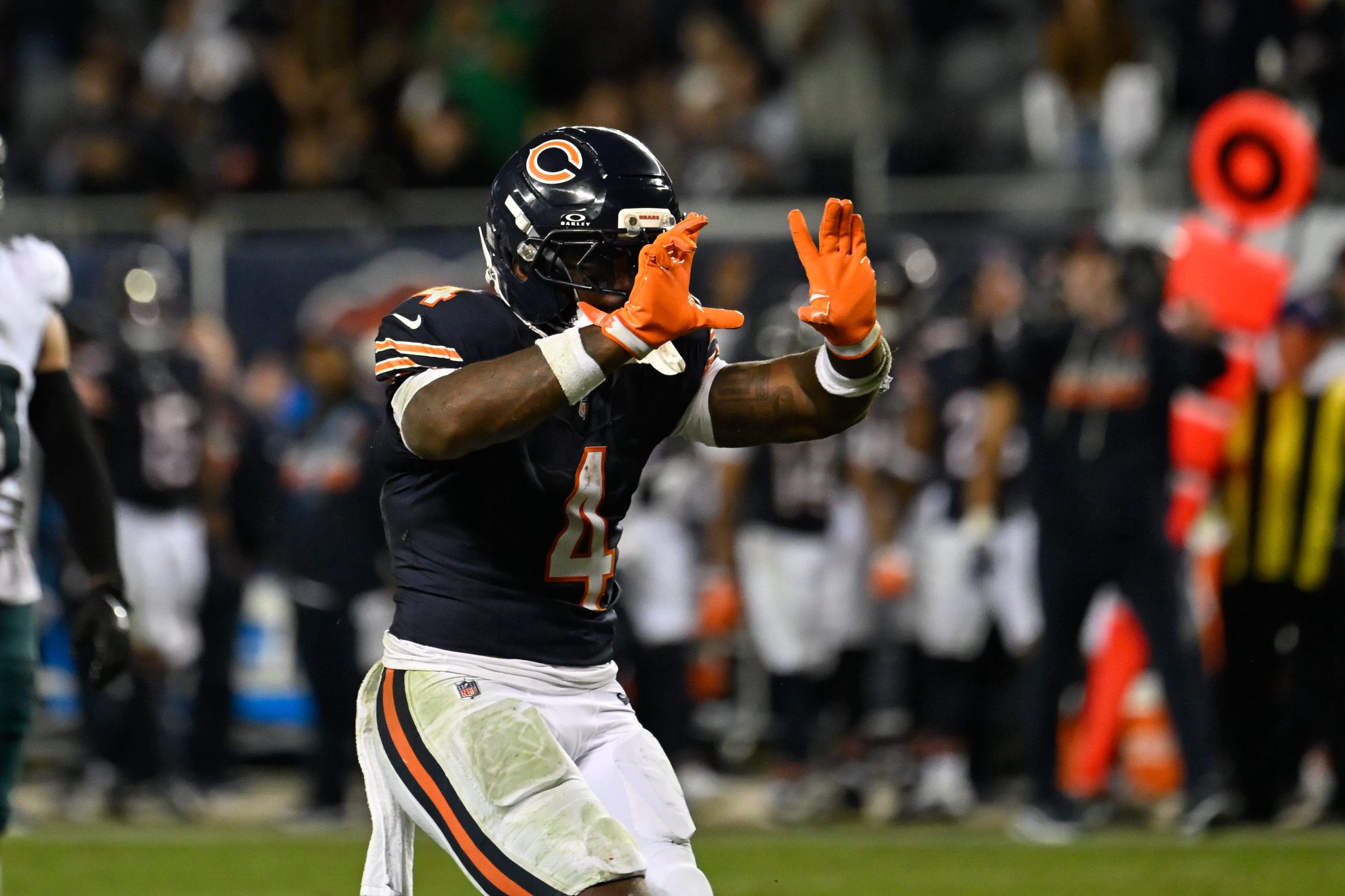 Sep 28, 2026; Chicago, Illinois, USA;  Chicago Bears running back D'Andre Swift (4) reacts after getting a first down during the second half against the Philadelphia Eagles at Soldier Field. Mandatory Credit: Matt Marton-Imagn Images