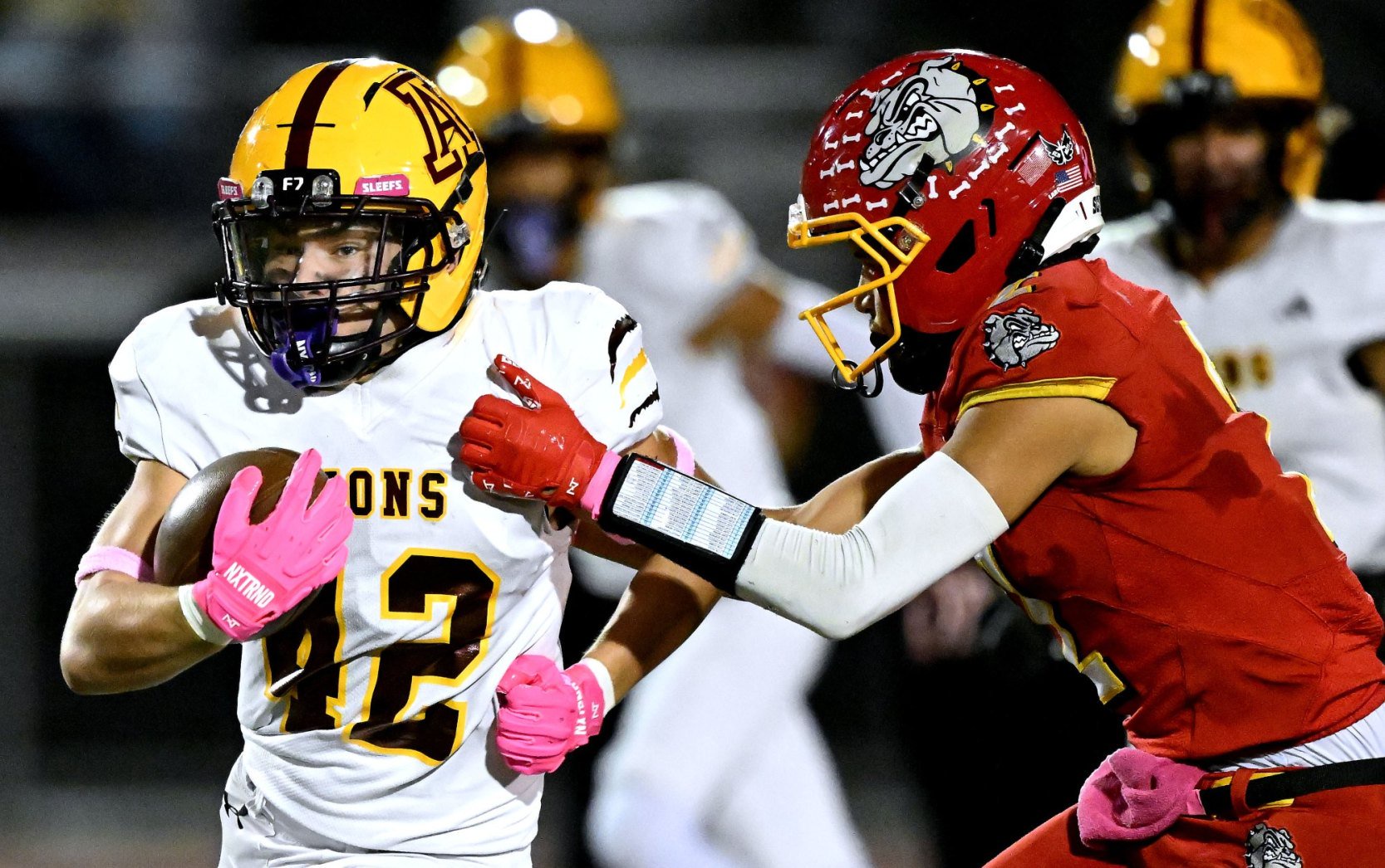 Arlington linebacker Chris Jimenez #42 runs for a first down as Hemet outside linebacker James Abner #2 pulls him down in the Inland Valley League football game in Hemet on Thursday, Oct. 15, 2026. (Photo by Terry Pierson, The Press-Enterprise/SCNG)

