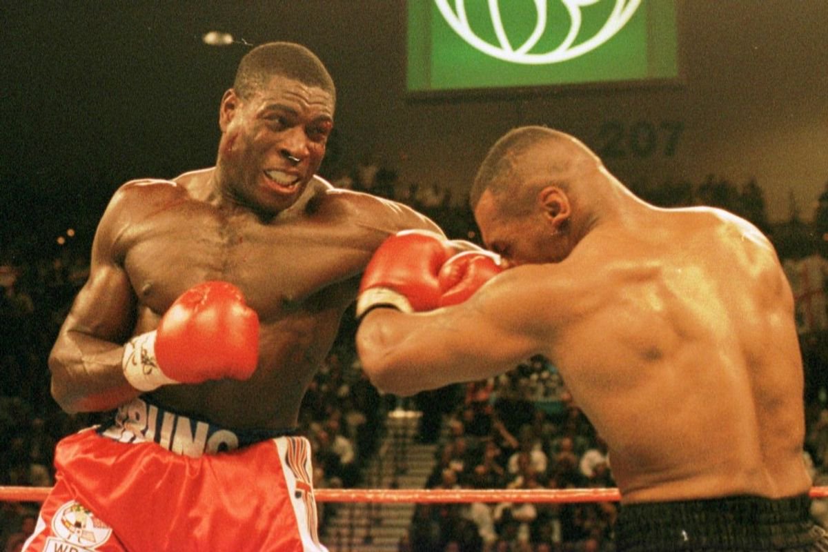 March 16th, 1996: Frank Bruno lands a rare punch on Mike Tyson's chin during the WBC world title fight in Las Vegas on March 16th, 1996.