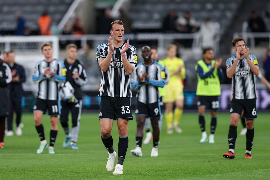 Newcastle United players after losing to Villa