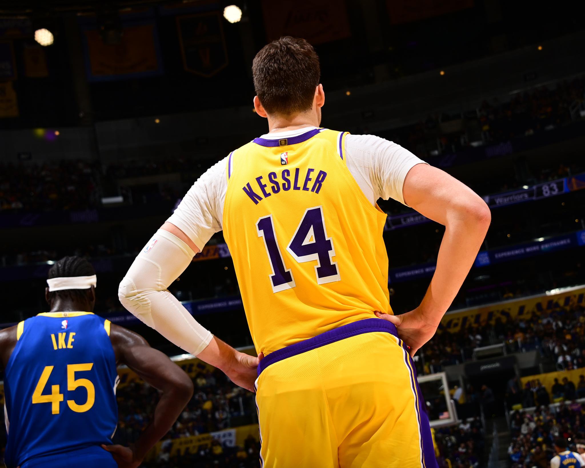 Walker Kessler of the Los Angeles Lakers stands on the court with his hands on his hips during a game against the Golden State Warriors.