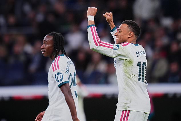Real Madrid's Kylian Mbappe celebrates after scoring third goal during the La Liga soccer match between Real Madrid and Sevilla in Madrid, Spain, Sunday, Oct. 18, 2026. (AP Photo/Manu Fernandez)