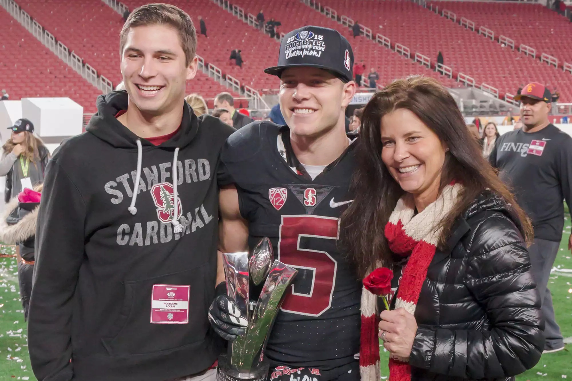 Christian McCaffrey with his brother Max McCaffrey and his mother Lisa McCaffrey following the Pac-12 Championship Game on December 5, 2015 at Levi's Stadium in Santa Clara, California. 