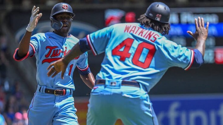 Jun 23, 2022; Minneapolis, Minnesota, USA;  Minnesota Twins outfielder Nick Gordon (1) celebrates his solo home run against the Cleveland Guardians with third base coach Tommy Watkins (40) during the third inning at Target Field. Mandatory Credit: Nick Wosika-USA TODAY Sports