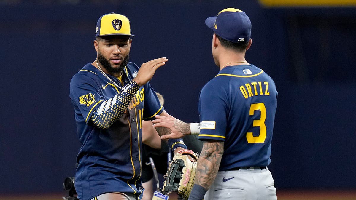Jackson Chourio celebrates with Joey Ortiz after World Series Game 3.