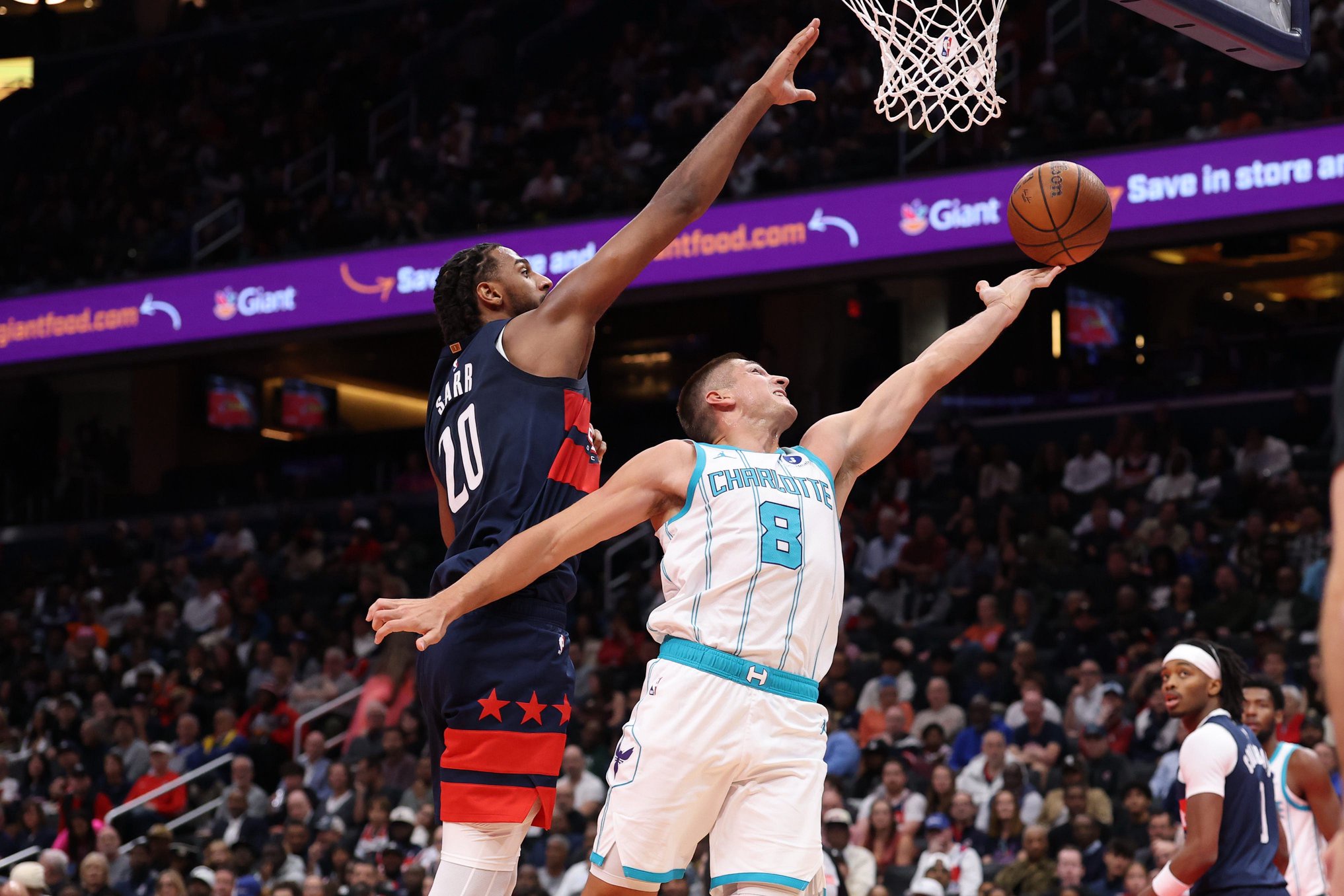 Oct 30, 2026; Washington, District of Columbia, USA; Charlotte Hornets guard Grayson Allen (8) shoots the ball as Washington Wizards center Alex Sarr (20) defends in the first half in an NBA Cup game at Capital One Arena. Mandatory Credit: Geoff Burke-Imagn Images