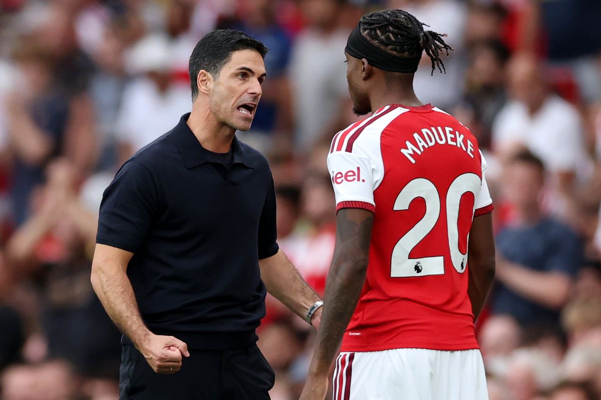 Mikel Arteta, Manager of Arsenal, reacts with Noni Madueke of Arsenal during the Premier League 2026/27 match between Arsenal FC and Chelsea FC at Emirates Stadium on September 06, 2026 in London, England