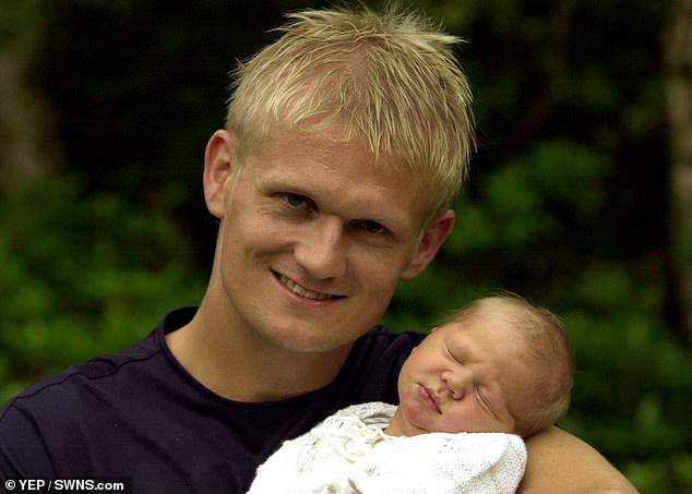 Haaland Snr, then at Leeds United, pictured with Erling shortly after he was born in July 2000