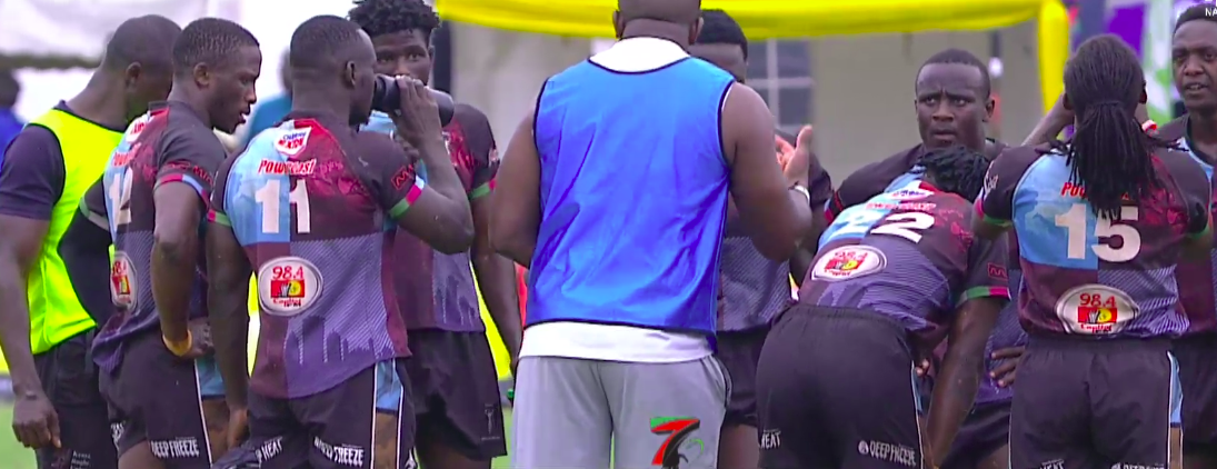 Willy Ambaka address Kenya Harlequin during a halftime break. PHOTO/Screen Grab
